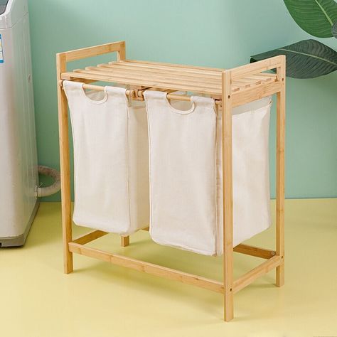 This laundry basket comes with a 2-tier table top, you can easily place your folded clothes, and it also helps you store other essentials such as detergent and softener in a convenient place. Laundry Sorter, Bath Organization, Clothes Hamper, Laundry Bags, Hamper Basket, Bathroom Storage Organization, Bamboo Frame, Laundry Storage, Linen Canvas