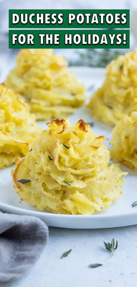 Ditch the mashed potatoes for gorgeous with this easy-to-make recipe! Boiled potatoes mixed with milk and egg yolks are piped and baked in the oven for a crispy outside and fluffy inside. Make your holiday table for Thanksgiving or Christmas extra fancy by serving this impressive side dish! Fancy Mashed Potatoes, Duchess Potatoes, Gluten Free Recipes Side Dishes, Whipped Potatoes, Potatoes In Oven, Mashed Potatoes Recipe, Gluten Free Potatoes, Mashed Potato Recipes, Side Dish Recipes Easy