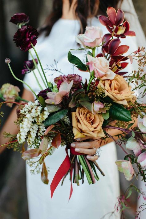 unstructured bridal bouquet with toffee toned roses #weddingbouquet #redweddingbouquet #toffeeroses #weddingflowers Toffee Rose Wedding, Toffee Rose Bouquet, Dairy Farm Wedding, Toffee Rose, Small Backyard Wedding, South Melbourne, Warehouse Wedding, Rose Wedding Bouquet, Melbourne Wedding