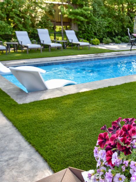 fiberglass pool, synthetic turf, ledge loungers Pool With Turf, Pool Turf Pavers, Pool Pavers With Turf, Pool With Pavers And Turf, Pool With Astroturf, Rectangle Fiberglass Pool With Tanning Ledge, Ledge Lounger, Pools Backyard Inground, Synthetic Turf