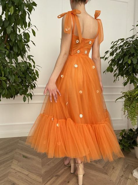 Spring Tulle Dress With Bow, Spring Tulle Dress With Bow Detail, Tulle Dresses With Bow, Fitted Orange Organza Dress, Summer Tulle Dresses With Bow Straps, Fitted Orange Tulle Dress, Orange Prom Dress For Spring, Summer Tea Length Dresses With Tulle Skirt, Tea Length Tulle Skirt Dress For Summer