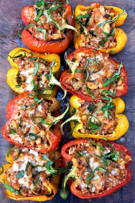 These vegetarian stuffed peppers are absolutely amazing, and just may become one of your favorite meals to make! Colorful bell peppers stuffed with zucchini, onion, garlic, farro, beans, tomato, spices, and melted cheese, it’s a meal that the whole family will love! #vegetarianmeals #vegetariandinners #healthymeals #healthydinners #stonesoupblog Veggie Stuffed Peppers, Family Vegetarian Meals, Vegetarian Stuffed Peppers, Vegetarian Italian, Meatless Mondays, Vegetarian Entrees, Tasty Vegetarian Recipes, Italian Dinner, Vegetarian Dinners