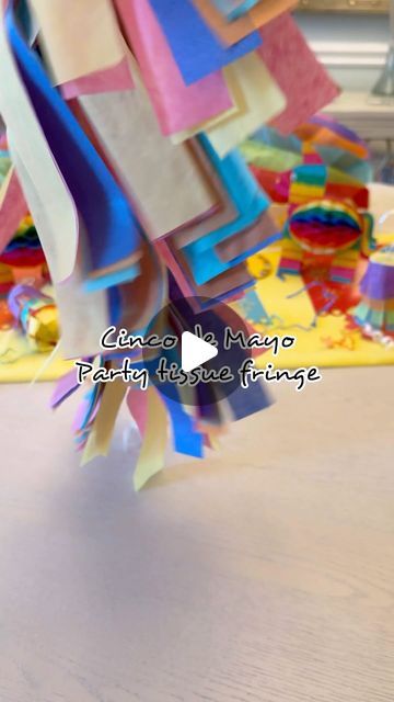 Felicia Pettit | CREATING PARTIES & GIFTS on Instagram: "🎉Cinco de Mayo DIY party tassel. Start by folding multi colored tissue paper in half. Staple string to the top of tissue paper. Then cut 1” strips in tissue paper making the fringe. Hang your festive tassel fringe along walls, tables, or on balloons for a vibrant touch to your celebration! 🎉   Like, Follow, & Save for parties  #cincodemayo #fiesta #cincodemayoparty #fiestaparty #diyparty #diypartydecor #partyideas #party #partydecor #partydecorations" Diy Party Tassels, Balloon Tassel Diy, Tissue Paper Fringe Garland, Mayo Diy, Tissue Paper Fringe, Tissue Paper Garlands, Simple Songs, Super Simple Songs, Tissue Paper Tassel