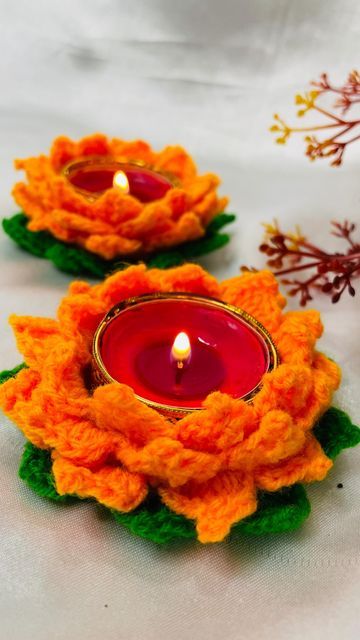 Craftorite |Resin|PaperCraft on Instagram: "Beautiful and unique lotus tealight holder 🪷 Limited pieces available 🚨 Grab them before they stock out.. Dm to order📱 #craftorite #crochet #tlightholder #tealightholder #diwali #diwalihampers #diwalidecorations #diwaligifts #diwalidecor #tealight #homedecor #handmade #hindufestival #uniquedecor #lucury #interior #smallbusiness #smallbusinessowner" Diwali Crochet Ideas, Christmas Theme Crochet, Crochet Diwali Decoration, Crochet Exhibition, Wedding Rukhwat, Crochet Minis, Diwali Theme, Crochet Candle Holder, Tea Light Crafts