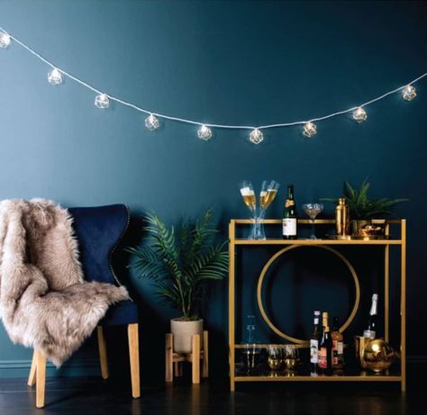 28 Ways to Use Those Magical String Lights | Apartment Therapy String Lights Living Room, String Lights Inside, String Lights In The Bedroom, Hanging String Lights, Trendy Apartment, Urban Barn, Bedroom Decor Cozy, Indoor String Lights, Christmas Bedroom