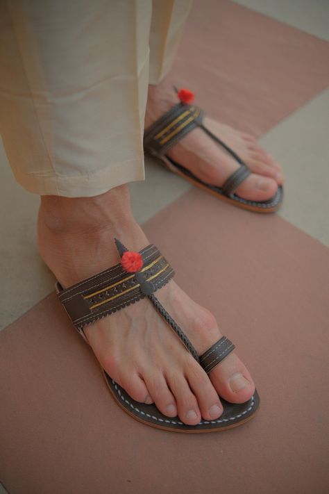 By using kolhapuri you can rock indian wear. Kholapuri Chappal Men, Kolapuri Chapal Man, Kolhapuri Chappals Men, Indian Men Aesthetic, Indian Footwear, Kolhapuri Chappals, Straw Shoes, Indian Shoes, Fashion Shoes Heels