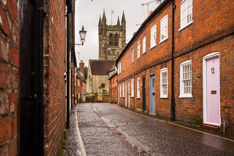 Narrow cobbled lane with old terraced houses and St Andrews Parish Church Farnham Surrey, Surrey England, Mews House, St Andrews, England Uk, Terrace House, Family History, Terrace, Favorite Places