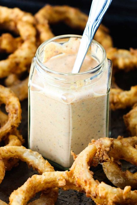 A jar of kickin' remoulade surrounded by onion rings Bbq Sauce Homemade Easy, Bloomin Onion, Dip Sauce, Sweet Potato Waffles, Remoulade Sauce, Fried Catfish, Outback Steakhouse, Gravy Sauce, Bbq Sauce Homemade