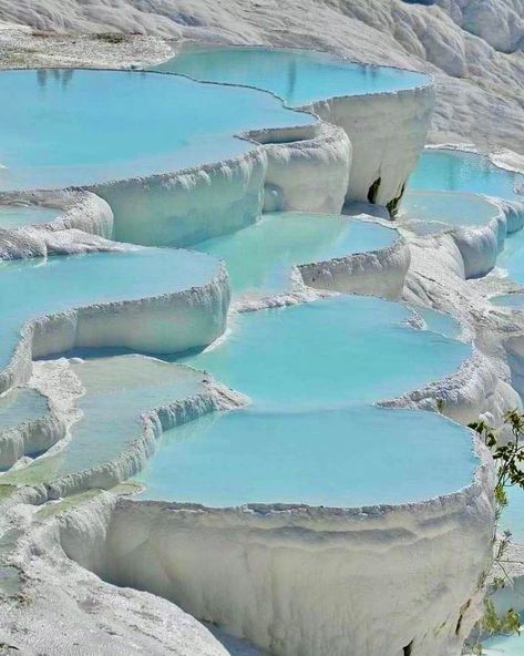 Discover the Dreamlike Wonder of Pamukkale: A Must-See Marvel in Turkey 🩵 Imagine a place where nature’s artistry meets ancient history—Pamukkale, often referred to as the “Cotton Castle” of Turkey, is exactly that. This extraordinary destination offers an ethereal landscape of dazzling white terraces cascading down like frozen waterfalls, filled with thermal waters that have been soothing visitors for thousands of years. Stroll barefoot along the travertine terraces, where warm mineral-ric... Cotton Castle, Ethereal Landscape, Santorini Villas, Pamukkale, Ancient History, Santorini, Terrace, Frozen, Castle