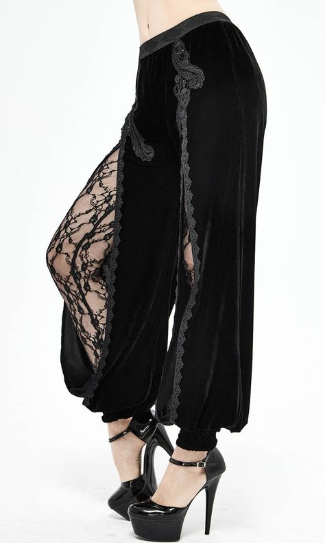 Turn heads as you stroll past in style in the show stopping Alabasta Harem Pants. Pair with a cute cropped top and chunky platforms for a real festival goth vibe. Features:- Elastic Waistband- Embroidered Lace Detail on Leg Splits- Flower Mesh Leg Panels- Elastic Feet Materials: Polyester 95% Spandex 5% SIZE CHART: In cms Size XS S M L XL 2XL 3XL Waistline 62 67 72 77 82 87 92 Hipline 82 87 92 97 102 107 112 Thigh 50 52.5 55 57.5 60 62.5 65 Leg Opening 19 20 21 22 23 24 25 Length 106 106.5 107 1 Gothic Floral, Velvet Flare Pants, Rock Style Clothing, Clothing Reference, Velvet Flares, Black Pants Men, Punk Rock Fashion, Victorian Clothing, Medieval Clothing