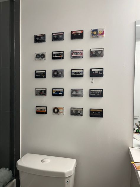 Picking up casettes from the street and putting them together in my bathroom Casette Aesthetic Vintage, Cassettes Aesthetic, 80’s Room, Rock Bedroom, Vintage Camera Decor, Ocean Room Decor, Bathroom Details, Tape Wall, Ocean Room