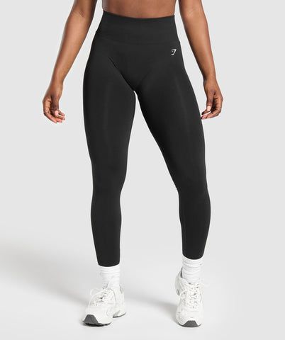 ADD A LITTLE EXTRA These collections take your staples and give you something a little bit extra. • Lightweight seamless material, great for running, cycling, light exercise, or just relaxing on your days off. Just don't do any squats in it (IYKYK).• High waisted fit for comfort Note:The Everyday collection isn't designed for heavy lifting or high-intensity training. To make it comfy af, the collection's made with a lightweight seamless material that can become sheer when it’s stretched. SIZE &a Grey Gymshark Leggings, Black Sports Leggings With Snug Fit, Black Snug Fit Sports Leggings, Black Snug Fit Leggings For Sports, Black Leggings For Sports, Breathable Snug Fit Athleisure Leggings, Breathable Snug Fit Activewear For Running, Casual Seamless Gym Leggings, Moisture-wicking Snug Fit Tights For Training