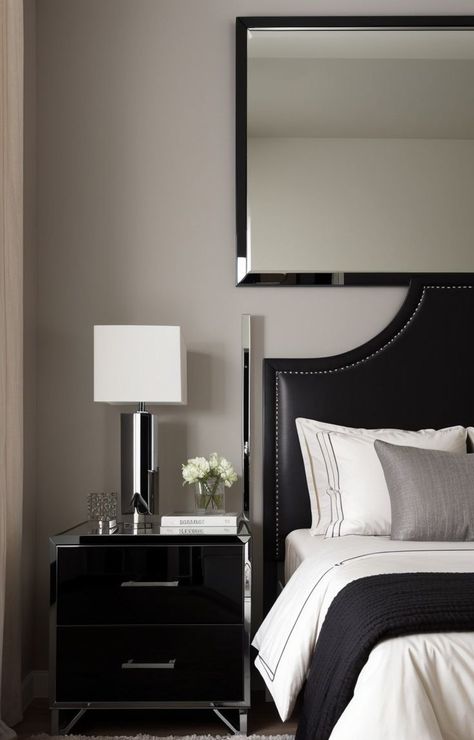 Create a sleek and modern bedroom aesthetic with a black faux leather headboard. Style it with chrome accents, such as a metal nightstand and a decorative mirror, to add a touch of elegance to the space. Black Leather Headboard Bedroom, Leather Headboard Bedroom, Modern Bedroom Aesthetic, Black Headboard Bedroom, Black Leather Headboard, Faux Leather Headboard, Headboard Bedroom, Metal Nightstand, Guest Bedroom Design