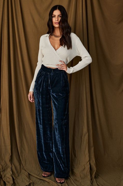 MATERIALS: - slate blue velvet pants - thick waistband - wide leg fit - functional pockets at the hips - clasp and zip fly closure - self: 65% rayon 35% polyester - lining: 97% polyester 3% spandex - hand wash cold - runs small, recommended to size up SIZE RECOMMENDATIONS: Small - rise: 10.25" - inseam: 32.5" - leg opening: 12.75" - waistband: 2" thick Medium - rise: 10.5" - inseam: 32.75" - leg opening: 13.25" - waistband: 2" thick Large - rise: 10.75" - inseam: 33" - leg opening: 13.75" - wais Velvet Pants Outfit, Blue Velvet Pants, Fall Wardrobe Staples, White Crop Tank, Black High Waist, Stylish Jackets, Velvet Pants, Casual Design, Girls Denim