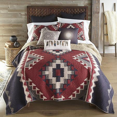 The Mojave red 3pc quilt set from your lifestyle by donna sharp is designed with a large-scale pattern based on a traditional southwest woven pattern. Colors include charcoal, camel, warm tan, and brick red. The lining is a tan ticking stripe. Easy care machine washable, 100% polyester fabric. All accessories sold separately. # Pieces In Set: 3Included: 2 King Sham(s), 1 Quilt(s)Features: QuiltedBedding Thread Count: 140Quilt Style: PrintedWarmth Factor: MidweightBed Size: KingFill Weight: 6 1/2 Southwest Bedding, Southwest Quilts, Dec Pillows, Western Bedroom, King Quilt Sets, Red Quilts, Inspire Me Home Decor, Decor Pillows, King Bedding Sets