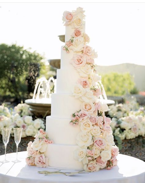 Big Wedding Cakes With Flowers, White And Blush Wedding Cake, Tall Wedding Cakes Elegant, Wedding Cakes Pink Flowers, Over The Top Wedding Cakes, Wedding Cake With Pink Roses, Big White Wedding Cake, Wedding Cake For 200 Guests, Massive Wedding Cake