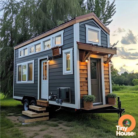 Check out this charming tiny house on wheels!  It features a Ranch design style with a sleek Charcoal Gray and White color palette. What do you think of the architectural details? Would you incorporate any of these elements into your own home? #tinyhouse #design #architecture White Color Palette, Ranch Design, Tiny House On Wheels, Architectural Details, Architectural Designs, Tiny House Design, House On Wheels, Design Architecture, Charcoal Gray