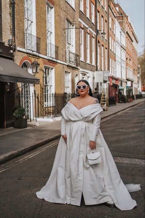 Brunette plus sized bride wears an off the shoulder ivory wedding dress with full skirts and white cats eye sunglasses Plus Sized Woman, Plus Size Brides, Plus Size Bride, Curvy Bride, Wedding Vision, Plus Sized, Cap Dress, Planning A Wedding, Wedding Images