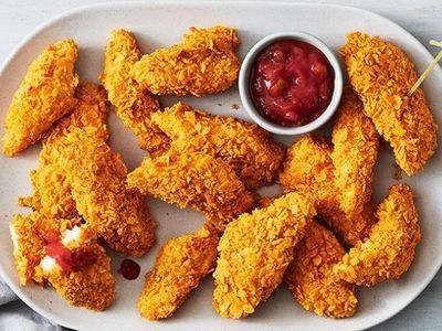 Nacho Cheese Doritos make these golden chicken tenders extra crunchy. Nacho Cheese Doritos, Nachos Cheese, Crumbed Chicken, Homemade Sausage Rolls, Chicken Tenders Recipe, Golden Chicken, Chicken Kiev, Buttermilk Chicken, Australia Food