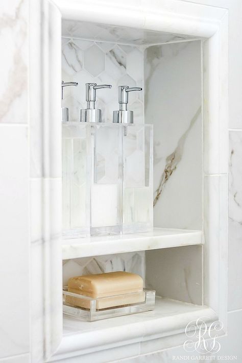 5 Stylish ways to Make your Bathroom Feel Custom Bathroom Shower Nook Ideas, Shower Niche Shelf Ideas, Shower Window Shelf, Powder Bathroom Accessories, Oblong Marble Tile Bathroom, Collins Interiors Bathroom, 12x20 Shower Niche, Statuary Marble Bathroom, Master Bath Hand Towel Ideas