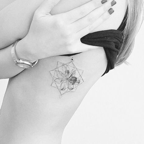 Geometric flower tattoo Tato Geometris, Geometric Flower Tattoo, Petit Tattoo, Tattoo Trend, Tato Lengan, Geometric Flower, Foot Tattoo, 문신 디자인, Rib Tattoo