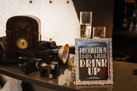 Roaring 20s Black and Silver Wedding Decor with Prohibition Ends Here Bar Sign, Vintage Cameras and Radio Prohibition Wedding, Silver Wedding Decor, Black And Silver Wedding, Gatsby Inspired Wedding, End Of Prohibition, Silver Wedding Decorations, Roaring 20's, Wedding Vendor, Vintage Theme