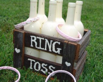 Rustic Ring Toss Game,pink,reclaimed barn wood,rustic wedding,wedding reception,wedding kids game,childrens game,childrens activity Boda Ideas, Rustic Wedding Decorations, Barn Parties, Ring Toss Game, Rustic Rings, Ring Toss, Wedding Activities, Wine Bottle Decor, Wedding Games