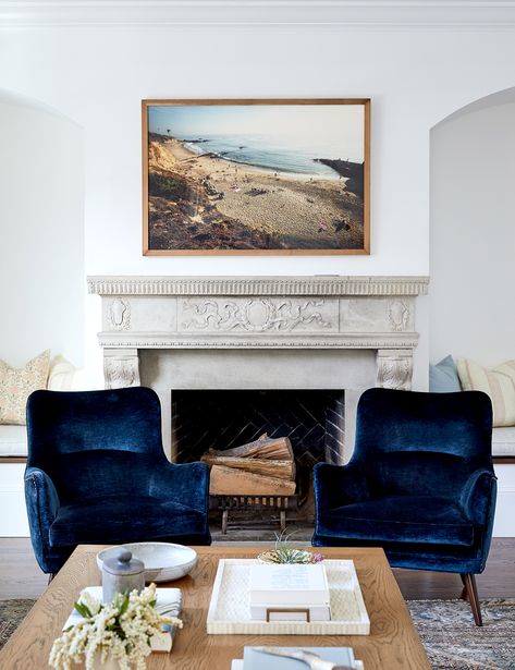 Straight from the Hearth: Beautiful Fireplace Surround Ideas Velvet Chairs Living Room, Sideboards And Buffets, San Francisco Home, Blue Velvet Chairs, Gorgeous Fireplaces, Mantel Surround, Dining Room Accents, Blue Accent Chairs, Velvet Chairs