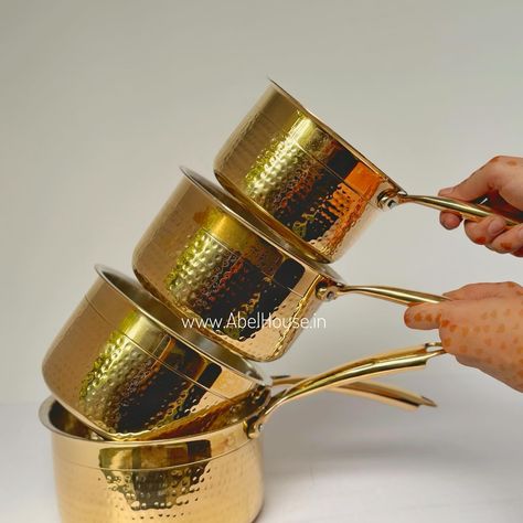 Introducing our latest collection of brass kitchenware that marries elegance with utility. From shimmering pans and saucepans to sleek stockpots, canisters, and spice boxes—every piece promises to enhance your culinary creations and beautify your kitchen space. Get ready to elevate your cooking experience with our handcrafted brass essentials. . . . #BrassKitchenware #CulinaryExcellence #HandcraftedCookware #KitchenDecor #NewLaunch #atmanirbhar #vocalforlocalindia #proudlymadeinindia Brass Kitchenware, Copper Decor, Saucepans, Spice Box, Silver Collection, Kitchen Room Design, Kitchen Space, Cooking Utensils, Kitchen Room