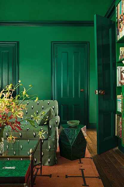 Further, paint sheen is used creatively, with walls in flat matte Amazon Moss 2037-10 contrasted with doors in semi-gloss Rainforest Foliage 2040-10. Jewel Tone Paint Colors, Rainforest Foliage, Stone End Table, Modern Maximalism, Emerald Green Paint, Maximalist Interior Design, Green Painted Walls, Bold Paint Colors, Maximalist Interior