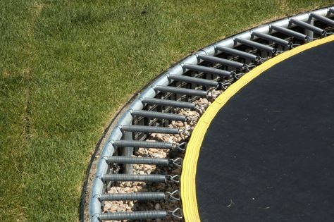 Sink your trampoline in the ground Ground Level Trampoline Diy, How To Sink A Trampoline, Trampoline Bunker, Under Trampoline Ideas, Trampoline Ideas, Inground Trampoline, Ground Trampoline, Sunken Trampoline, Backyard Kids