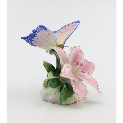 Elevate any interior with a touch of timeless beauty with this exquisite ceramic figurine. Boasting a glittering butterfly perched atop an intricate lily flower in bloom this exquisite piece provides a perfect accent to a nature-inspired Decor. The thoughtful is sure to bring a sparkle to any home. Pottery Lessons, Nature Inspired Decor, Ceramic Figurine, Dreamy Room, Clay Art Projects, Butterfly Decorations, Great Tattoos, Ceramic Figurines, Flower Pins