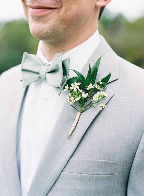 Grey suit and green and white boutonnière | Photography: Natalie Watson Photography Wedding Suits Men Grey, Grey Suit Wedding, Groomsmen Grey, Groom Bowtie, Green Bow Tie, Groom Ties, Wedding Suits Groom, Boutonniere Wedding, Gray Weddings