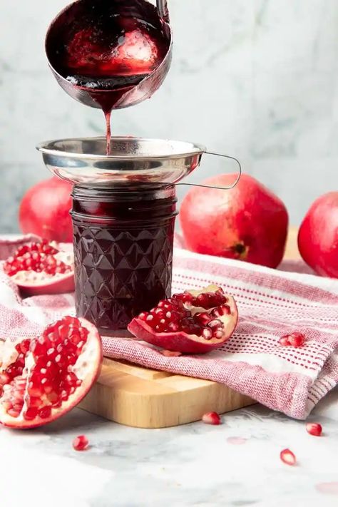 Pomegranate jelly is the perfect thing to add a little brightness to your morning toast. This simple recipe makes a great gift, too. Get the recipe for Homemade Pomegranate Jelly here. Pomegranate Pepper Jelly Recipe, Pomagranet Recipe Jelly, Pomegranate Jelly Recipe, Pomegranate Jam No Pectin, Pomegranate Jam Recipe, Pomegranate Jam, Jalapeno Jelly Recipes, Pomegranate Jelly, Low Sugar Jam