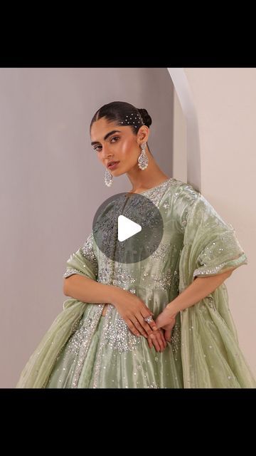 Sunnia Manahil Clothing on Instagram: "ERIS - Witness splendor with this beautiful lama front-open gown captivatingly adorned with intricate floral and geometric worked details. It is seamlessly paired with a green jamawar lehnga, meticulously crafted to complement the gown’s allure, and is accompanied by a matching green net dupatta, qualifying this outfit as an iconic embodiment of elegance and grace.

Avi Formals ‘24
Available now!

C 28, E Street, Block 4, Clifton, Khi

www.sunniamanahil.com

Studio: +92 304 8287073
Website: +92 309 5551444
Sunniamanahil@gmail.com

#sunniamanahil #aviformals #formals #handmade #handwork #designerwear #fashion #pakistanfashion" Jamawar Lehnga, Sunnia Manahil, Pakistan Fashion, Net Dupatta, Designer Wear, Front Open, Floral, Green, Clothes