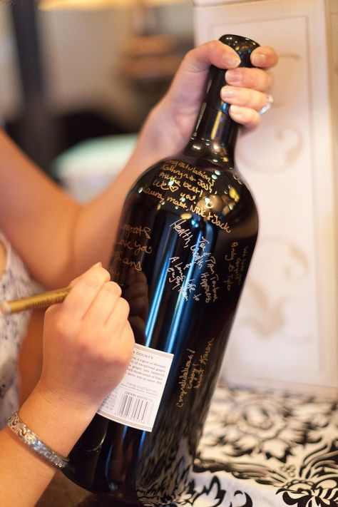 In lieu of a guest book, the couple had guests sign a magnum bottle of wine that they would share on their anniversary. Wine Bottle Guest Book, Batchlorette Party, Bachelorette Party Checklist, Wedding Guest Signing, Wine Bottle Centerpieces, Bottle Centerpieces, Awesome Bachelorette Party, Bridesmaid Duties, Wedding Guest Book Unique