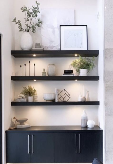 Black Floating Shelves Dining Room, Modern Office Shelf Decor, Styling Living Room Floating Shelves, Modern Dining Room Shelves, Dining Room Shelf Decor Modern, Black Shelves Decor Living Room, Top Shelves Decor, White Walls Black Shelves, Black And White Bookshelf Decor