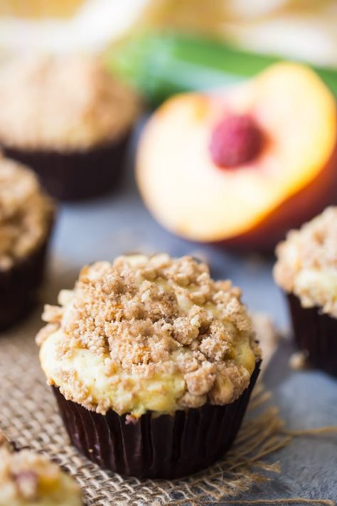 Peach Zucchini Crumb Muffins: moist, easy to make, and a perfect way to enjoy the seasonal flavors of late summer. #healthy #easy #fresh #recipe #best #yogurt #moist #wholewheat #withcrumbtopping #baking #snacks #streuseltopping #butter #desserts #fruit #summer #food #mornings #cooking #brunch #simple #dairy #seasons #sweettreats #best #zucchinimuffins #zucchini #greekyogurt #breakfast #veggies Peach Zucchini Muffins, Peach Zucchini Bread, Breakfast Veggies, Peach Muffin Recipes, Baking Snacks, Zucchini Desserts, Zucchini Recipes Dessert, Peach Bread, Desserts Fruit