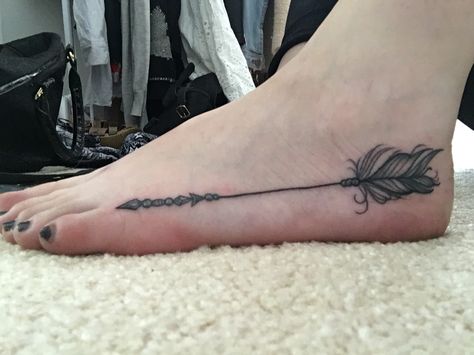 Wild arrow foot tattoo Name Arrow Tattoo, Keep Me Wild Tattoo, Ankle Henna Designs, Tattoo On Foot, Tattoo Foot, Ink Therapy, Finger Tattoo For Women, Wild Tattoo, Foot Tattoos For Women