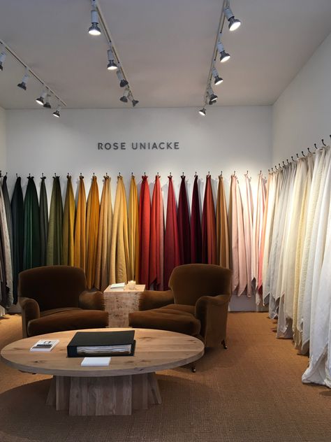 Highlights from Design Week 2020 - Design Centre Chelsea Harbour. Sumptuous fabrics in a spectrum of colour at Rose Uniacke’s understated stand at the Design Week Pop-up exhibition. Luxury fabric, interior inspiration. For more inspiration visit: www.thehousedirectory.com #yoursourcingdestination Fabric Showroom Design, Curtains Shop Design, Fabric Store Design Interior, Curtain Store Design, Fabric Store Interior, Textile Shop Interior Design, Show Room Design, Luxury Boutique Interior, Fabric Exhibition