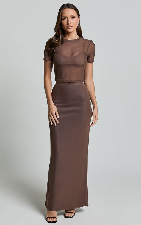 Get ready to turn heads in the Janet Top And Skirt Two Piece Set! This trendy co-ord set is perfect for any occasion, whether you're heading out for a casual day with friends or getting ready to party all night long. The chocolate brown color adds a touch of warmth and sophistication, while the mesh material gives it a fun and flirty vibe. Made from high-quality polyester, this ensemble is not only stylish but also comfortable to wear all day long.The short sleeve top features a scoop neck desig Realtor Fits, Spa Esthetic, Timeless Fits, Eclectic Closet, Midi Skirt Fall, Basic Black Dress, Skirt Two Piece, Sleek Chic, Chocolate Brown Color