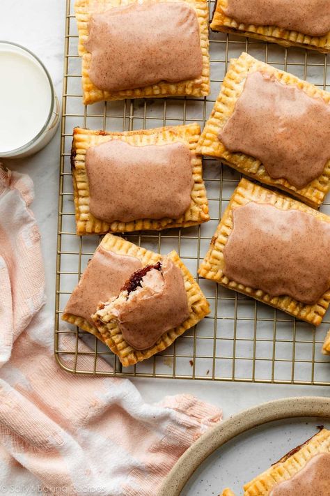 If you enjoy making from-scratch versions of store-bought favorites, you will love these homemade frosted brown sugar cinnamon pop tarts made with homemade pie crust. Like my chocolate pastry tarts recipe, this is a fun baking project you can absolutely handle if you follow my thorough step-by-step instructions. Recipe on sallysbakingaddiction.com Brown Sugar Cinnamon Pop Tarts, Cinnamon Pop Tarts, Brown Sugar Pop Tarts, Poptart Recipe, Sugar Pop, Homemade Nutella, Carlsbad Cravings, Chocolate Pastry, Vanilla Icing