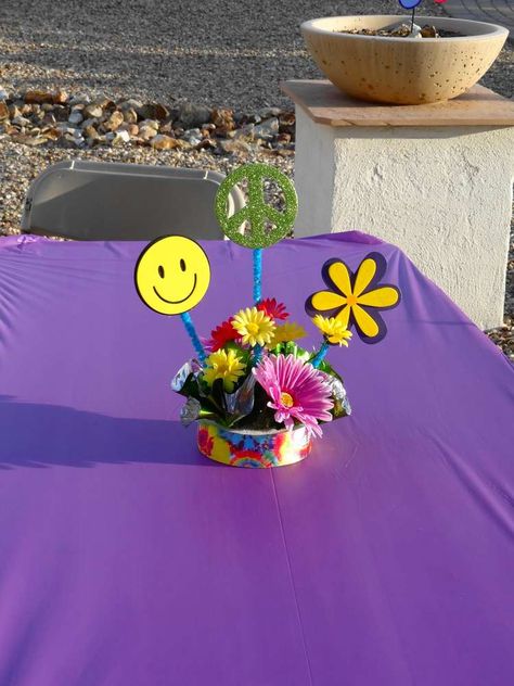 Groovy Tie-Dye Party | CatchMyParty.com 1960s Party Centerpiece, Tie Dye Centerpieces, Groovy Centerpiece Ideas, Tie Dye Birthday Party Ideas, Sixties Party, Hippy Party, Family Reunion Decorations, 60's Party, Tie Dye Birthday Party