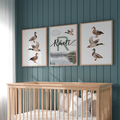 **FRAMES NOT INCLUDED** Introducing our Personalized Duck Hunting Nursery Art Print, a delightful and charming addition to any child's room or nursery. This custom duck decor is designed to inspire your little one's imagination and bring a touch of outdoor adventure into their space. It also makes a perfect baby gift for those who love nature and hunting. Each art print is meticulously crafted with care and attention to detail. The design features a serene fishing scene, complete with a whimsical fishing rod, bobber, and a friendly fish ready to be caught. The personalized touch comes in the form of your child's name, beautifully integrated into the artwork, making it truly one-of-a-kind. Our nursery art prints are printed on high-quality archival paper, ensuring vibrant colors and excepti Fishing Themed Nursery Cabin, Fishing Themed Boys Room, Hunting And Fishing Room For Boys, Hunting Fishing Theme Nursery, Fishing Theme Bedroom Boys, Nursery Ideas Fishing, Boys Bedroom Fishing Theme, Fishing Nursery Theme Boy, Fly Fishing Nursery Theme