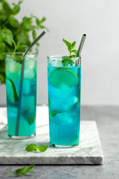 Blue Mojitos - The Littlest Crumb Blue Mojito Recipe, Green Cocktails, Thyme Simple Syrup, Blueberry Simple Syrup, Basil Simple Syrup, Classic Mojito, Best Summer Cocktails, Summer Flavors, Strawberry Mojito