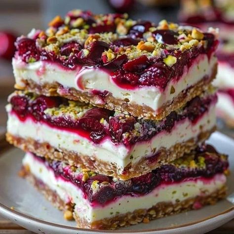 Make these Cherry Pistachio Cheesecake Bars for a delightful dessert! A perfect blend of flavors, easy to prepare, and absolutely delicious. Cheesecake Bars Recipes Easy, Cherry Pistachio, Pistachio Cheesecake, Cheesecake Bar Recipes, Cherry Cheesecake, Cherry Pie Filling, Cheesecake Bars, Graham Cracker Crumbs, Graham Cracker