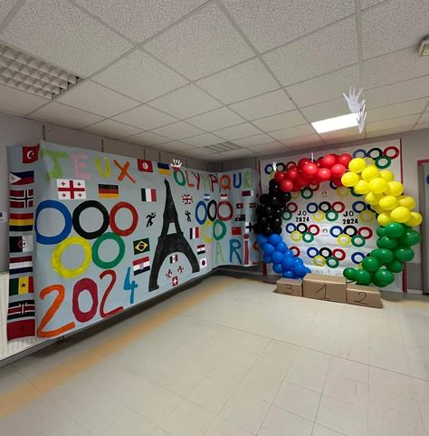 Olympic Podium Diy For Kids, Olympics Balloon Arch, Office Olympics Decorations, Back To School Olympic Theme, Olympic Spirit Week Ideas, Olympic Photo Booth, Olympic Theme Decorations, Olympic Photo Backdrop, Olympic Decorations Classroom