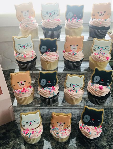 Mini royal icing cat face themed sugar cookies as a cupcake topper Cat Themed First Birthday Party, Cat Birthday Cupcakes, Kitten Cakes Birthday, Cat Cakes For Kids, Cat Cupcakes Ideas, Cat Birthday Party Cake, Cat Themed Birthday Party Food, Cat Themed Food, Cat Birthday Cakes