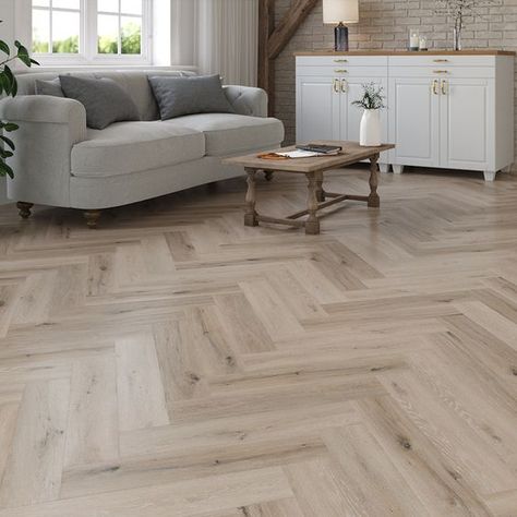 If you are looking for a premium quality floor at a budget-friendly price, the Lusso Taranto Seagrove Oak Herringbone SPC Click Vinyl Flooring is the perfect choice. Featuring a striking, luxurious real herringbone effect, this SPC floor can be installed anywhere in the home. Thanks to its highly durable core, it boasts incredible wear resistance, making it suitable for commercial as well as domestic environments. Easy to maintain and keep clean, it is a practical solution that is built to last for decades. It comes with an exemplary 20-year manufacturer warranty, giving you incredible value for money. The floor is supplied in realistic herringbone style planks, measuring 615mm long, 128mm wide, and 5mm thick. It even comes with a 1mm built-in underlay, adding both comfort and stability un