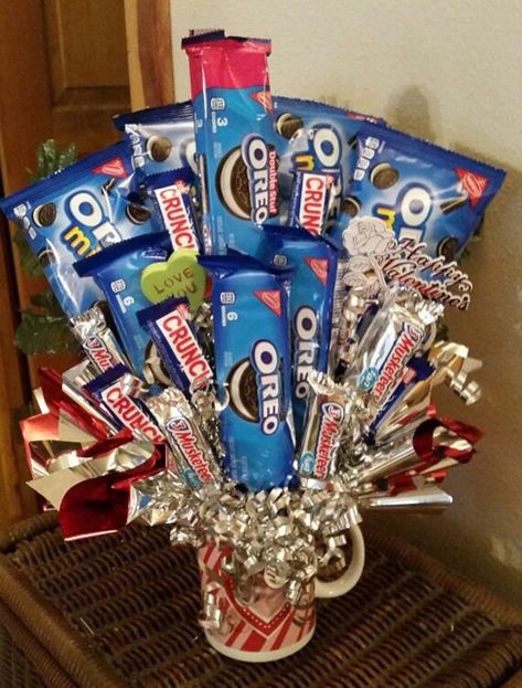 Happy Valentine's Day  Candy Bouquet Oreo Chocolate Cookie Bouquet Arrangement Happy Valentine's Day Valentine Candy  Made for the cookie monster in your life!  Can be customized with most any cookie or candy bar.  Bouquet is made in Valentine cup (cup design will vary).  Can also be customized for birthday, anniversary or most any occasion, male or female.   Bouquets are hand crafted when ordered so each one will vary slightly. Oreo Crunch, Birthday Candy Bouquet, Tricky Tray, Candy Bar Bouquet, Candy Gifts Diy, Bouquet Arrangement, Oreo Chocolate, Candy Cup, Cookie Bouquet